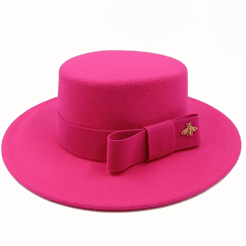Red Showlu Fedora hat with flat top, bumpy surface, bow tie, elastic band, unisex cotton polyester jazz style.
