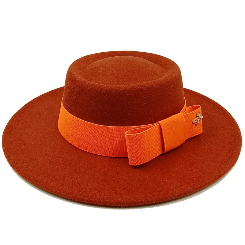 Red Showlu Fedora hat with flat top, bow tie, elastic band, and textured surface, unisex cotton polyester jazz hat.