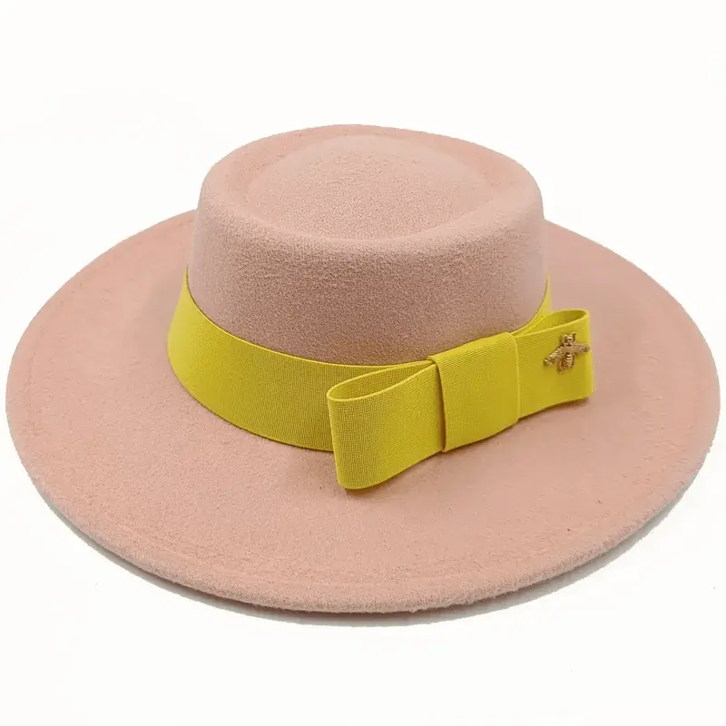Red Showlu Fedora hat with a flat top, bumpy surface, bow tie, and elastic band, suitable for men and women.