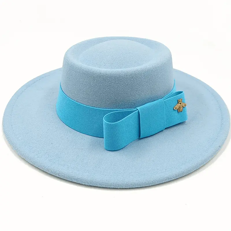 Red Showlu Fedora hat with flat top, bow tie, elastic band, and bumpy surface, suitable for men and women.