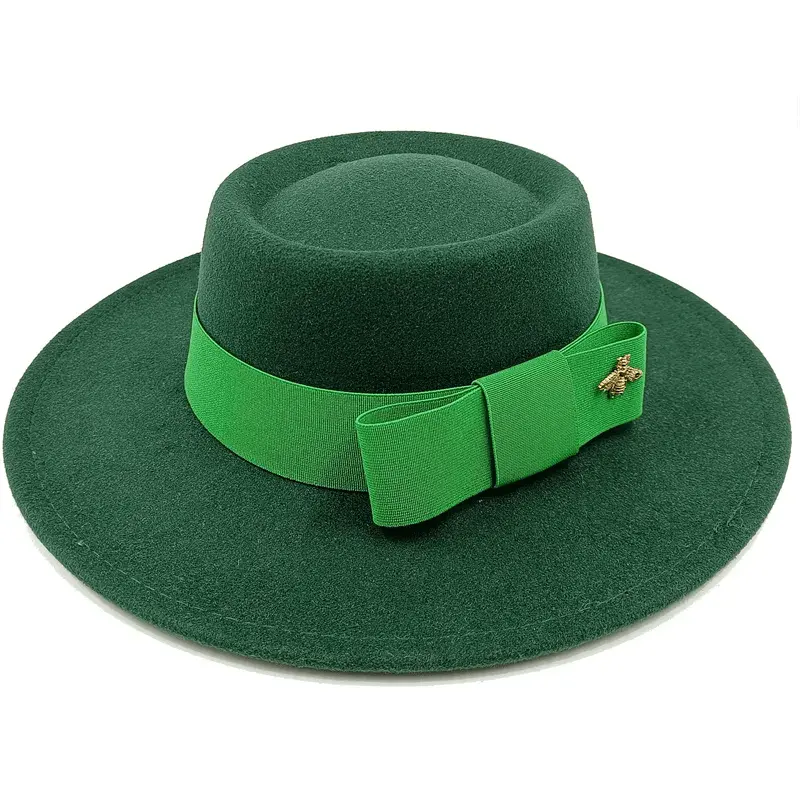 Red Showlu Fedora hat with a flat top, bumpy surface, bow tie, and elastic band, suitable for men and women.