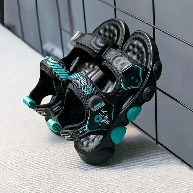 JGSHOWKITO boys beach sandals from Showlu Fashion Store, anti-skid summer sports shoes for kids, casual and comfortable for outdoor play.