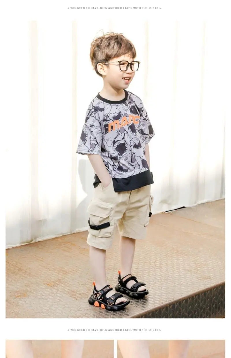 Kids' beach sandals by JGSHOWKITO, showing anti-skid summer sports shoes for boys, casual design, in size 26-37.