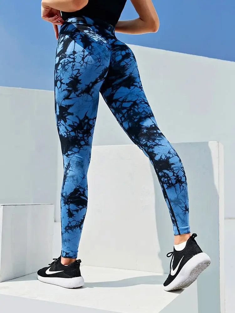 Colorful tie dye high waist seamless leggings by CHRLEISURE featuring booty lifting design and athletic stretch fabric for women.