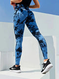 Colorful tie dye high waist seamless leggings from CHRLEISURE, featuring a booty lifting design for gym and casual wear.