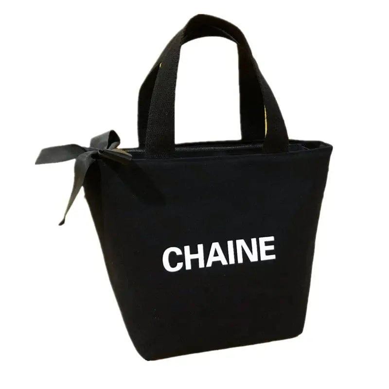 Solid color canvas tote bag from Showlu Fashion Store, small dumpling-style handbag ideal for office or casual use.