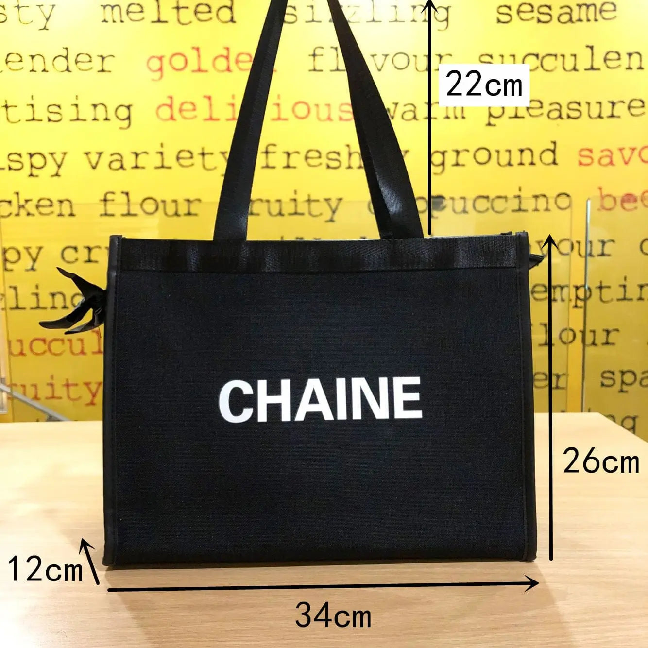 Solid color canvas tote bag from Showlu Fashion Store, small dumpling-style handbag for office or casual use.