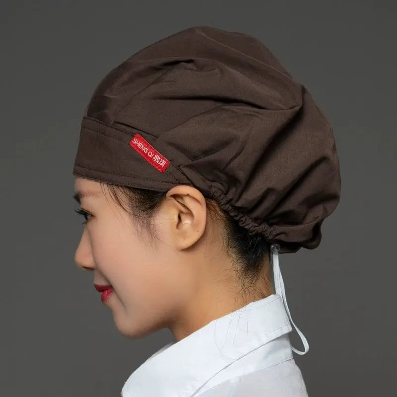 Breathable Shengqi chef cap for women, anti-smoke, hygiene cooking hat with dust protection for kitchen and catering use.