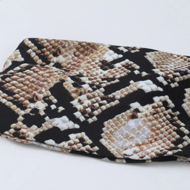 Showlu snake print bandeau bikini top with push-up design, paired with matching two-piece swimsuit, perfect for stylish swimwear.
