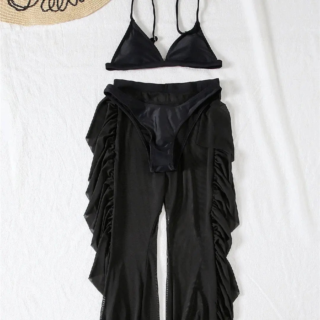 Showlu Fashion three-piece frill bikini set with see-through trousers, featuring stylish swimwear and lightweight transparent trousers.