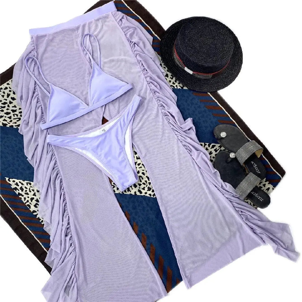 Showlu Fashion three-piece frill bikini set with see-through trousers, stylish swimwear for beach or poolside wear.