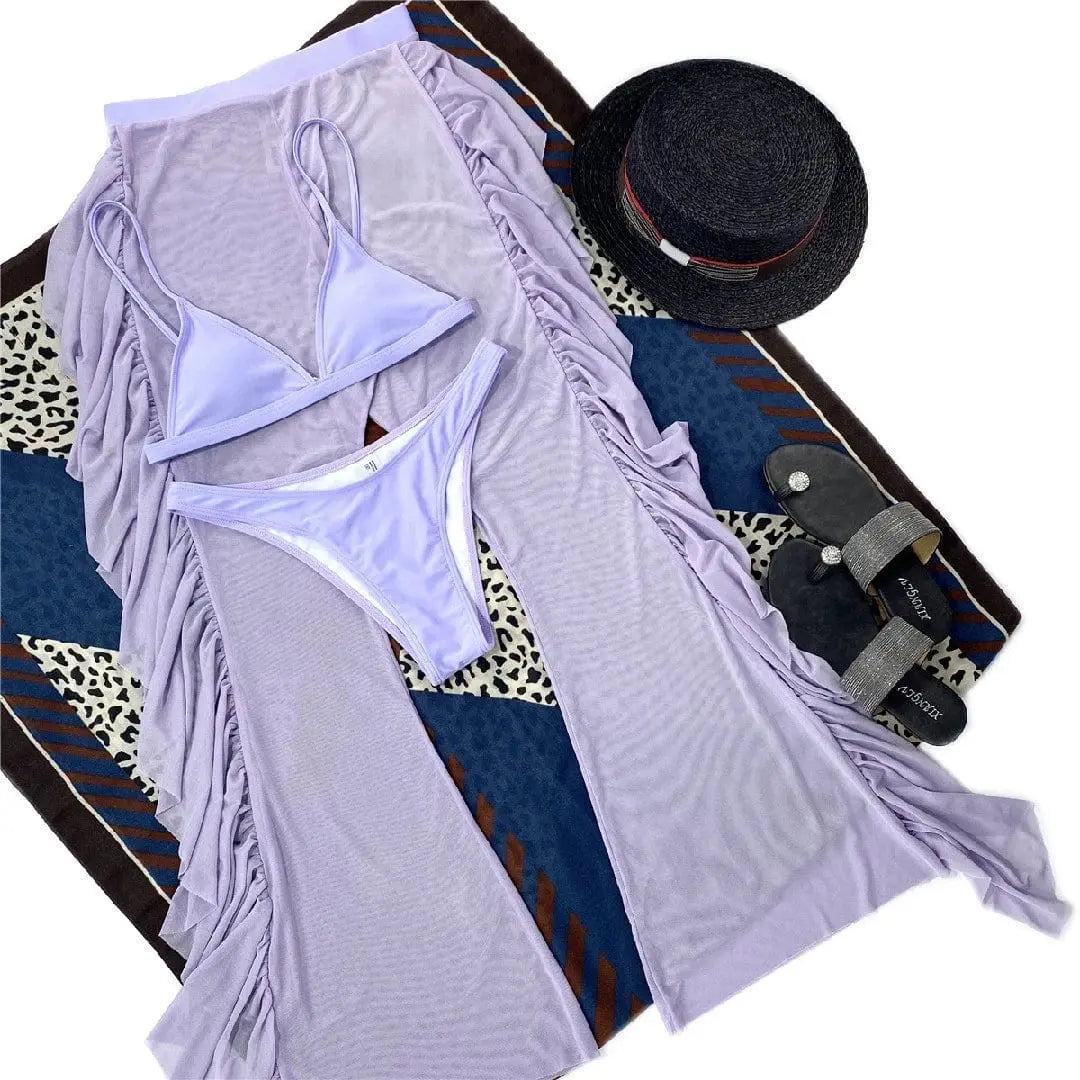 Showlu Fashion three-piece frill bikini set with see-through trousers, stylish swimwear for beach or poolside wear.