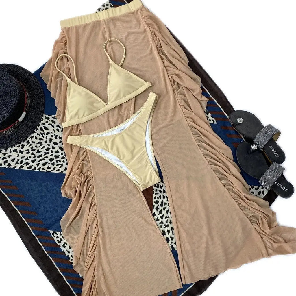 Showlu Fashion three-piece frill bikini set with see-through trousers, featuring stylish swimwear and lightweight sheer trousers.