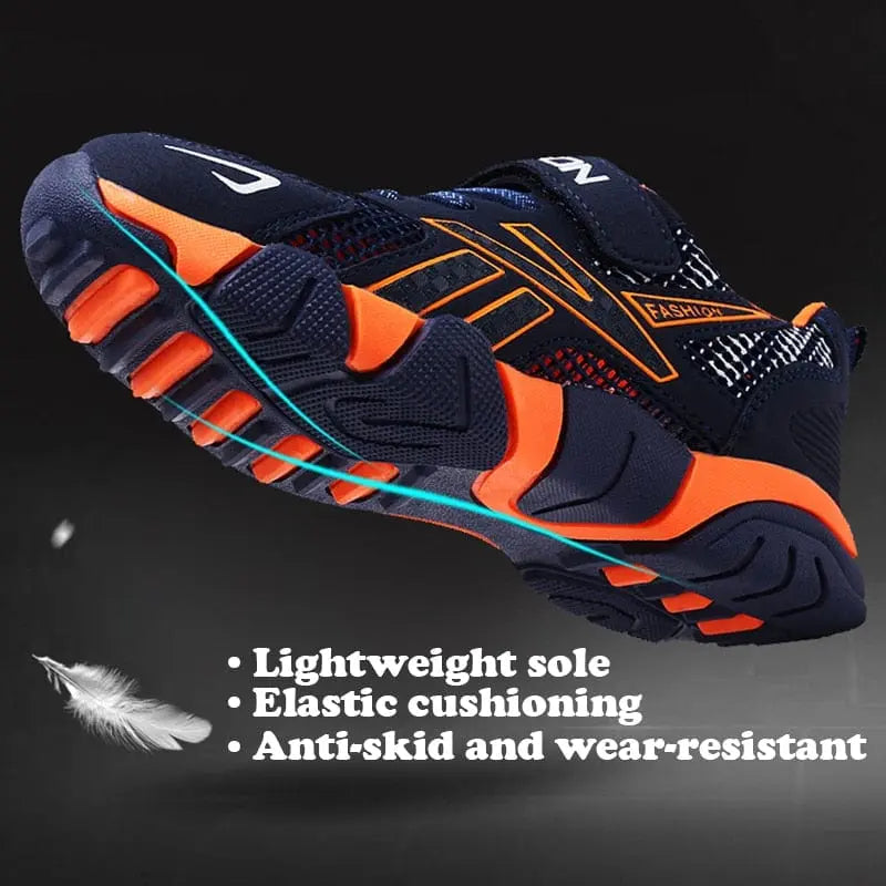 Children's boys mesh running shoes by Showlu Fashion Store, breathable sports sneakers with hook-and-loop straps for active kids.