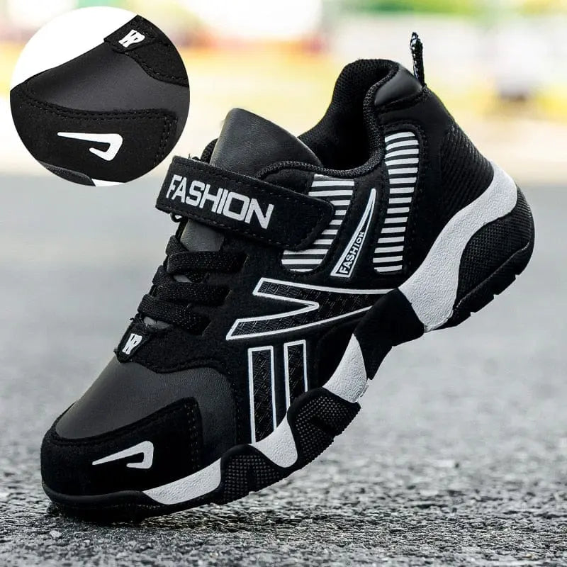 Showlu Fashion Store boys mesh running shoes with breathable design and hook-and-loop straps for kids' casual and sports activities.