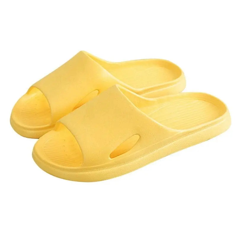Comwarm EVA platform slippers for men and women, non-slip indoor outdoor slides with soft, cushioned soles for home or bathroom use.