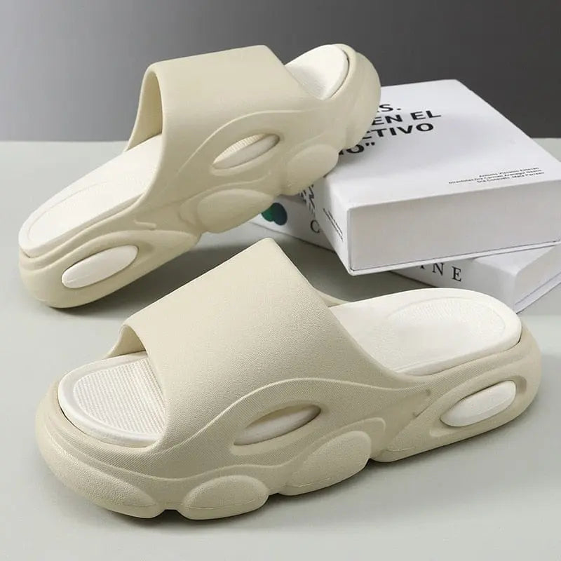 Comwarm platform EVA slippers for men and women, non-slip indoor outdoor slides with a soft, cushioned design and unisex style.