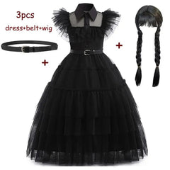 A black sleeveless layered mesh dress with a collar, a belt, and a braided wig.