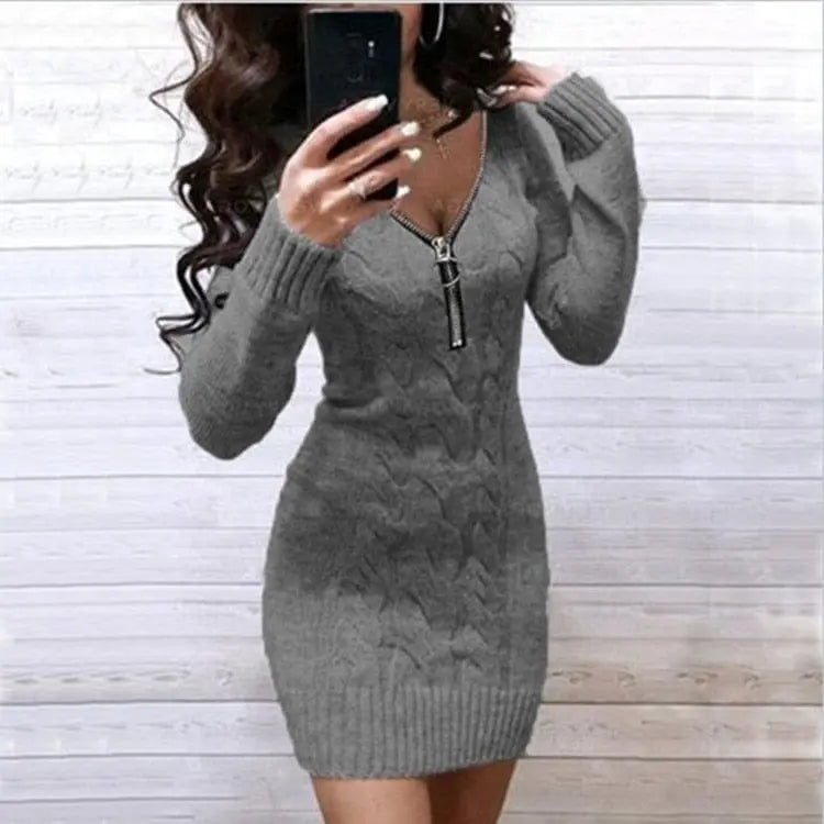 Cozy knitted women's sweater dress with zipper V-neck from Showlu Fashion, designed as a long, stylish gown.