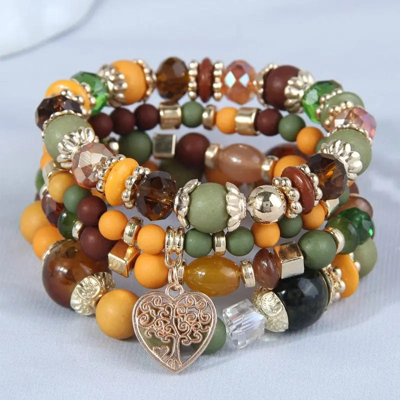 Bohemian white crystal beads strand bracelet with Tree of Life charm, showcasing ethnic and feminine style.