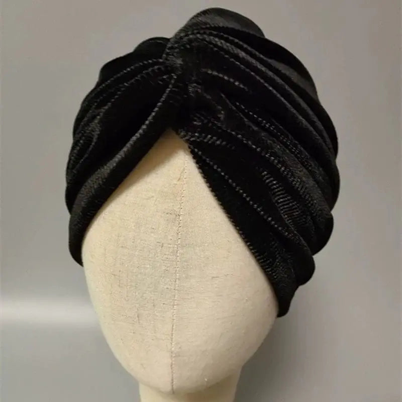 Gray velvet MiuMiu dome-style elastic beanie for women, stylish and cozy with a smooth fabric finish.