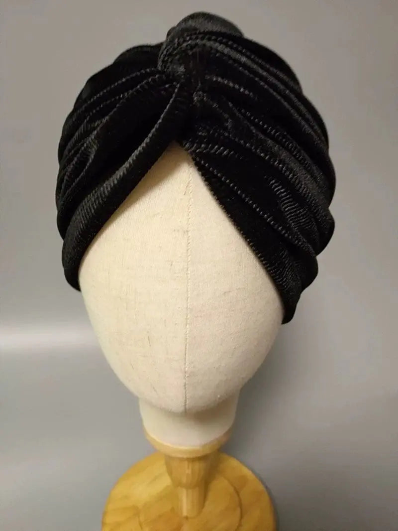 Gray velvet MiuMiu dome-style elastic beanie cap for women, featuring a soft, luxurious fabric and snug fit.