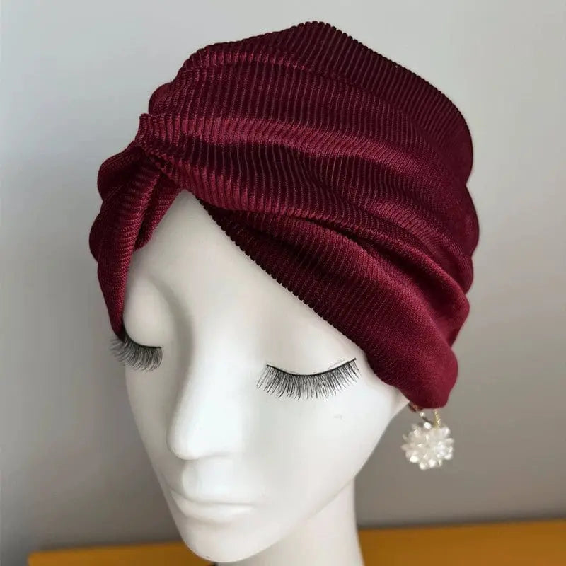 Gray velvet MiuMiu dome-style elastic beanie cap for women, showcasing soft fabric and stylish, snug fit.