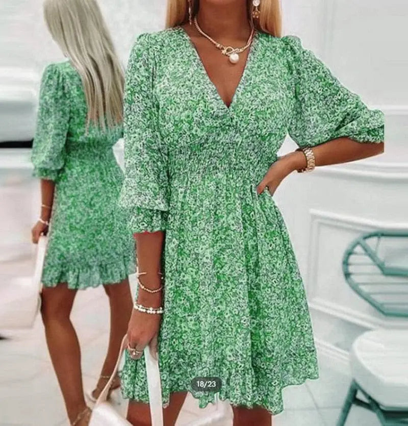 Elegant floral V-neck A-line summer dress for women by Showlu Fashion with short sleeves and feminine design.