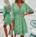 Elegant floral V-neck A-line summer dress for women by Showlu Fashion with short sleeves and feminine design.