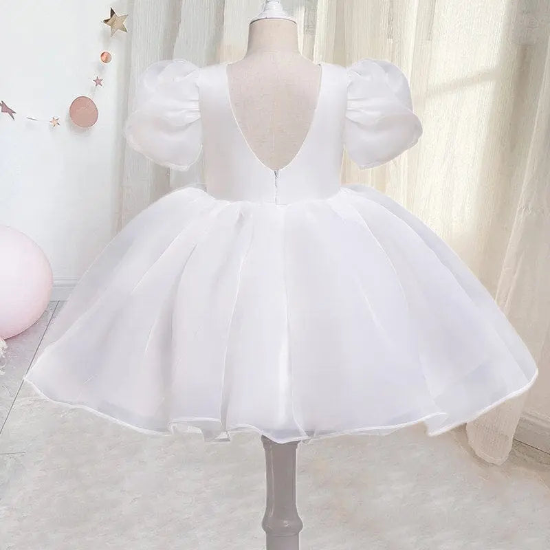 White tulle flower girl gown for kids, elegant fluffy dress perfect for weddings, birthdays, and special occasions by Showlu Fashion Store