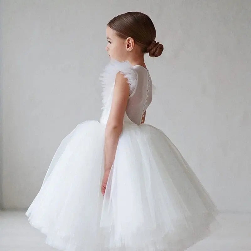 Elegant white tulle flower girl gown for kids, ideal for wedding, birthday, and special occasions, by Showlu Fashion Store.