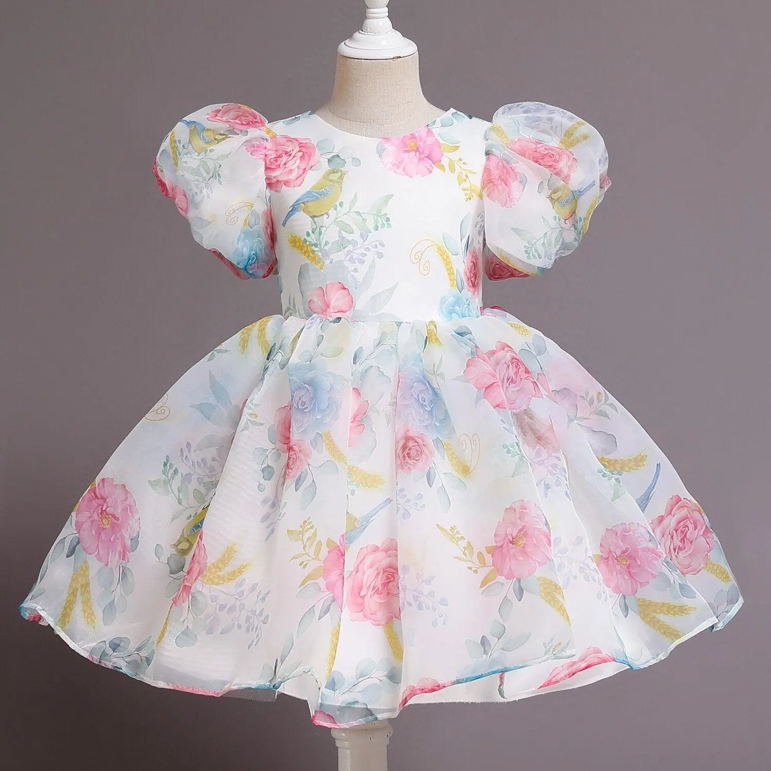 White tulle flower girl gown for kids, elegant fluffy dress perfect for weddings, birthdays, and special occasions by Showlu Fashion.