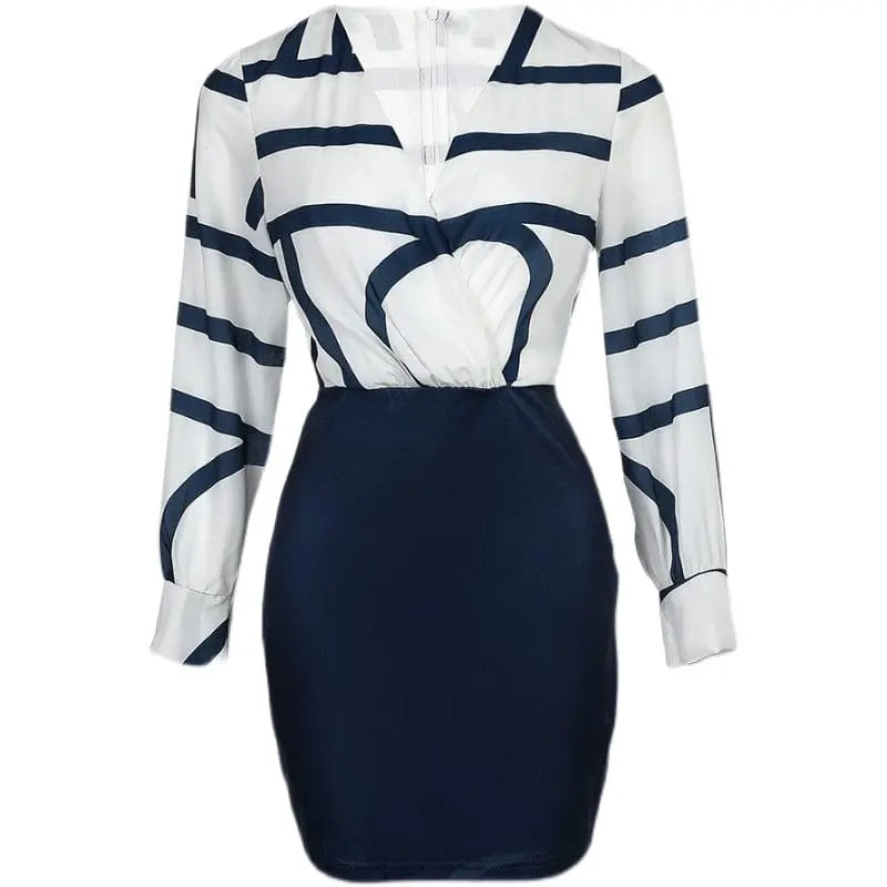 Slim-fit printed contrast color knee-length commuter dress by Showlu Fashion, featuring elegant design and stylish details.
