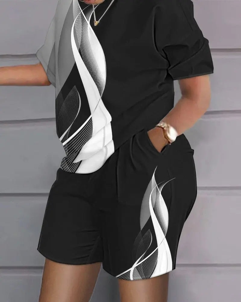 Showlu Fashion women's 2-piece sweatshirt set with loose T-shirt and hot pants, perfect for casual summer wear.