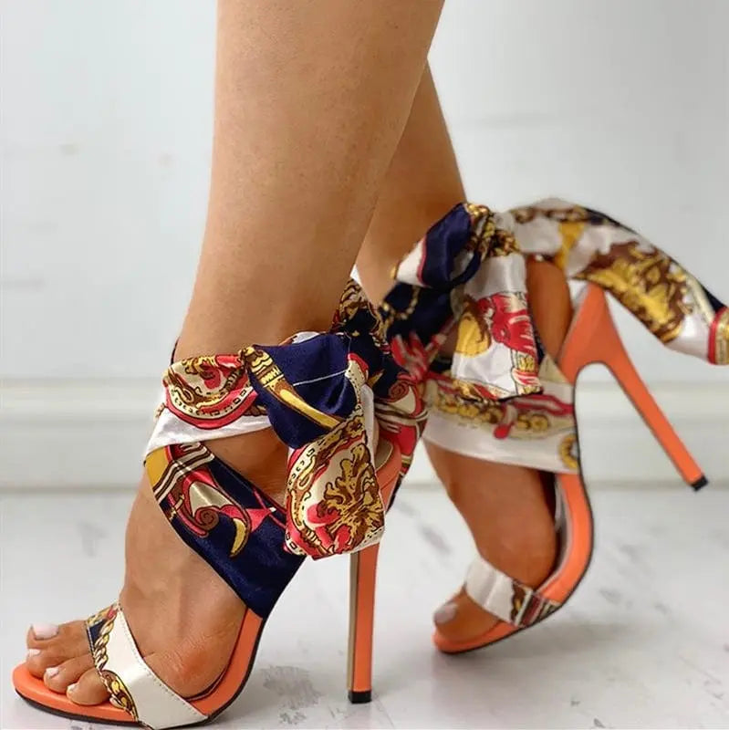 Showlu Fashion women's monogram stiletto heel bow bandage sandals with large size, European-American style, featuring a stylish design.