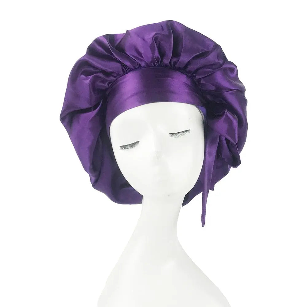 Showlu Store Nation African print satin bonnet with adjustable wide band, elastic head wrap, designed for comfortable sleep and hair protection.