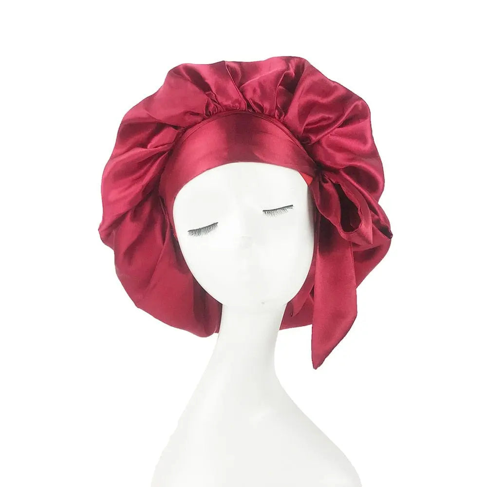 Showlu Store Nation African print satin bonnet with adjustable wide band, elastic head wrap, perfect for sleep and hair protection.