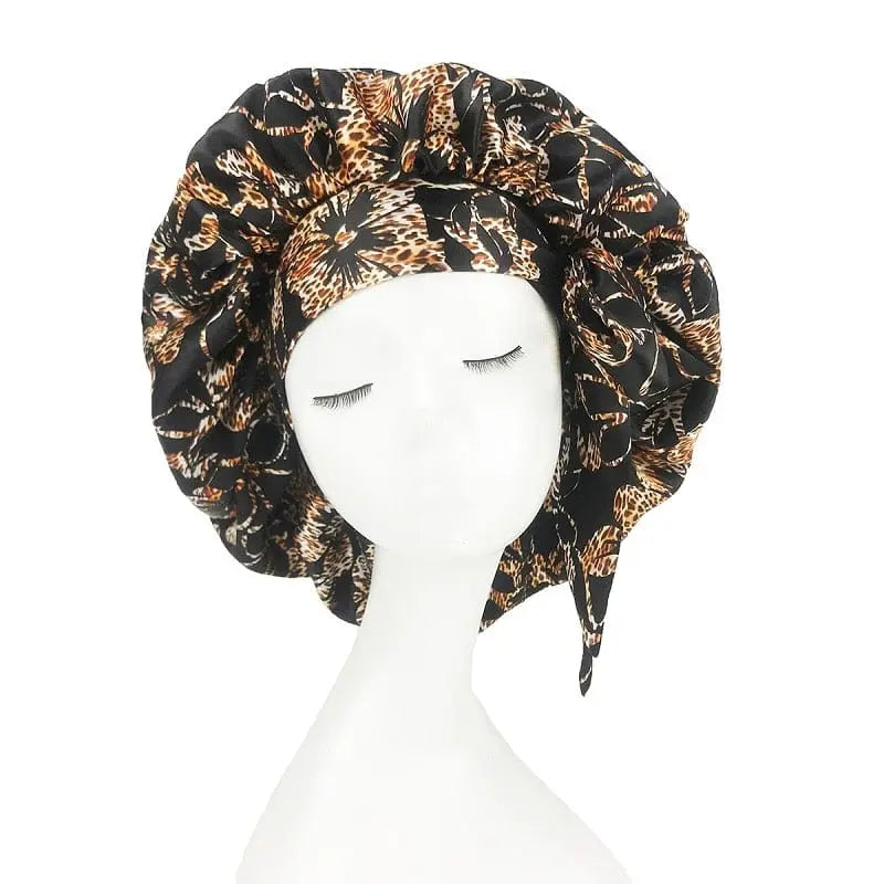 Showlu Store Nation African print satin bonnet with adjustable wide band, elastic head wrap, perfect for sleep and hair protection.