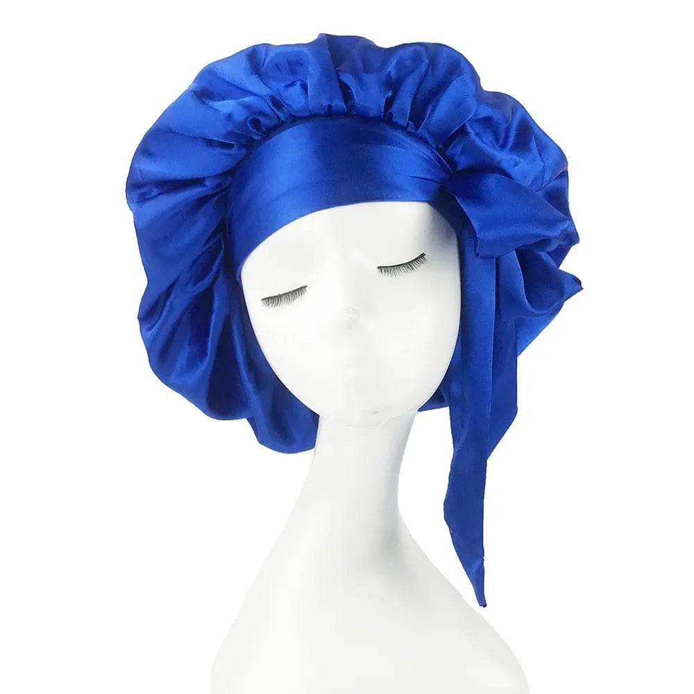 Large African print satin bonnet with adjustable wide band, elastic head wrap, ideal for sleep and hair protection.