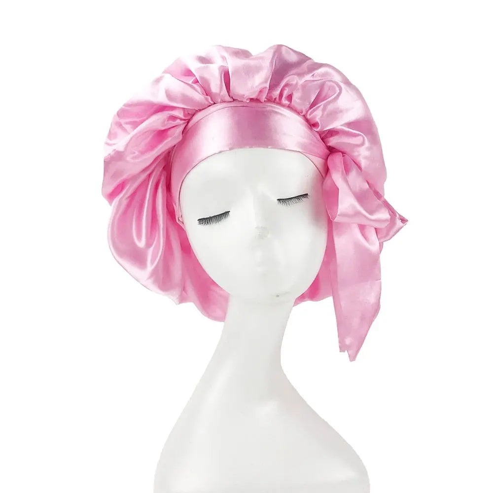 African print satin bonnet with adjustable wide band and elastic head wrap, designed for women’s sleep and hair protection.