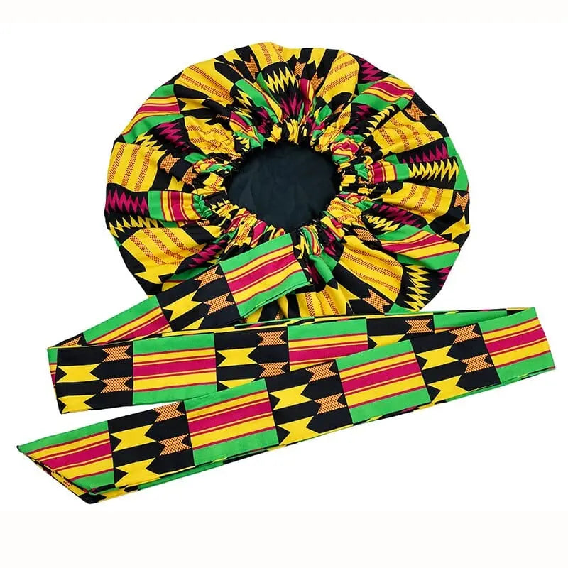 African print satin bonnet for women with adjustable wide band, elastic head wrap, and night sleep cap by Showlu Store Nation.