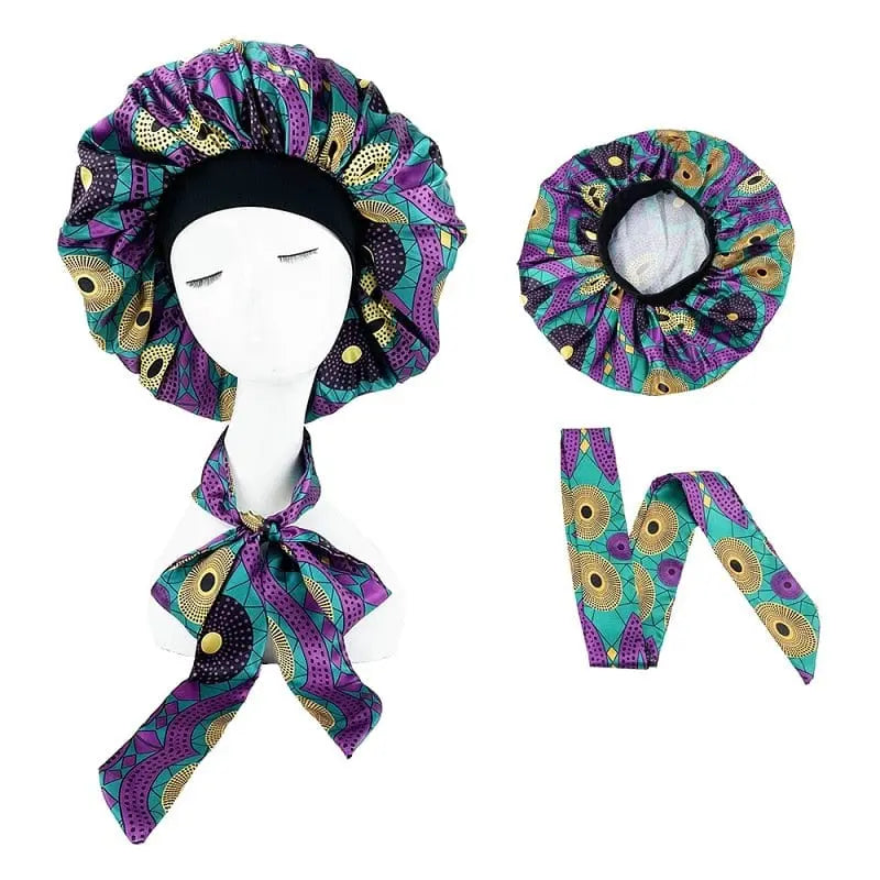 African print satin bonnet with adjustable wide band and elastic head wrap for women’s sleep and hair protection.