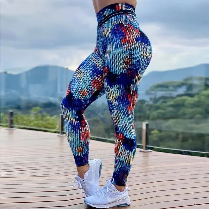 FCCEXIO women's tie-dye digital print high waist yoga leggings, shown in vibrant colors with a fitted design for fitness and workout.