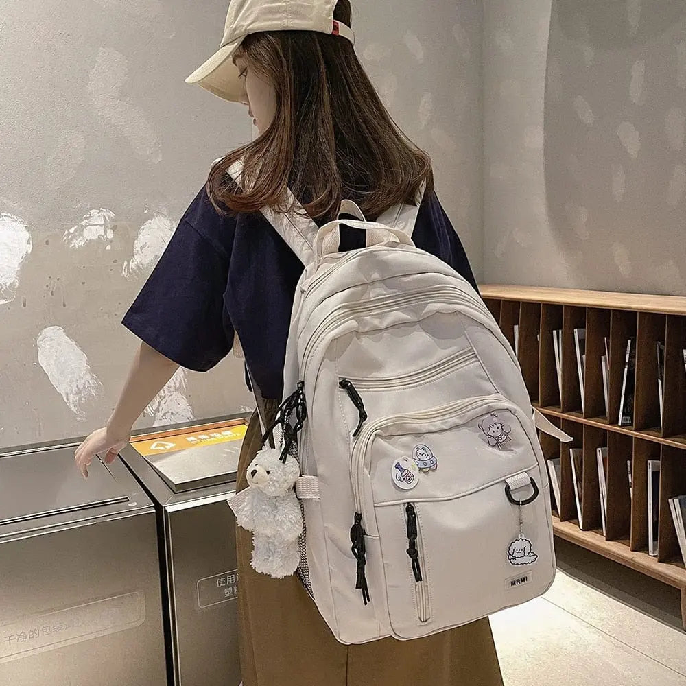 Showlu Fashion women's high-capacity nylon school backpack with laptop sleeve, featuring a stylish and functional design for students.