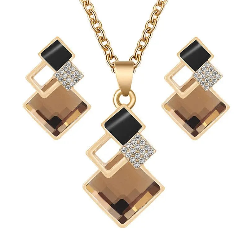 Cenmon Crystal Bridal Jewelry Set with geometric necklace and matching earrings, featuring sparkling crystals for wedding and special occasions