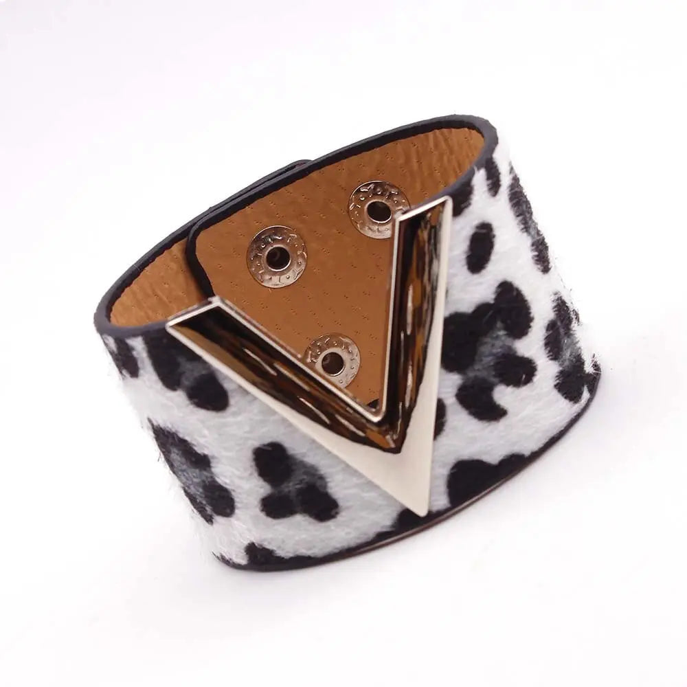 Leopard print leather wrap bracelet with geometric V charm and cuff design, stylish jewelry for women.