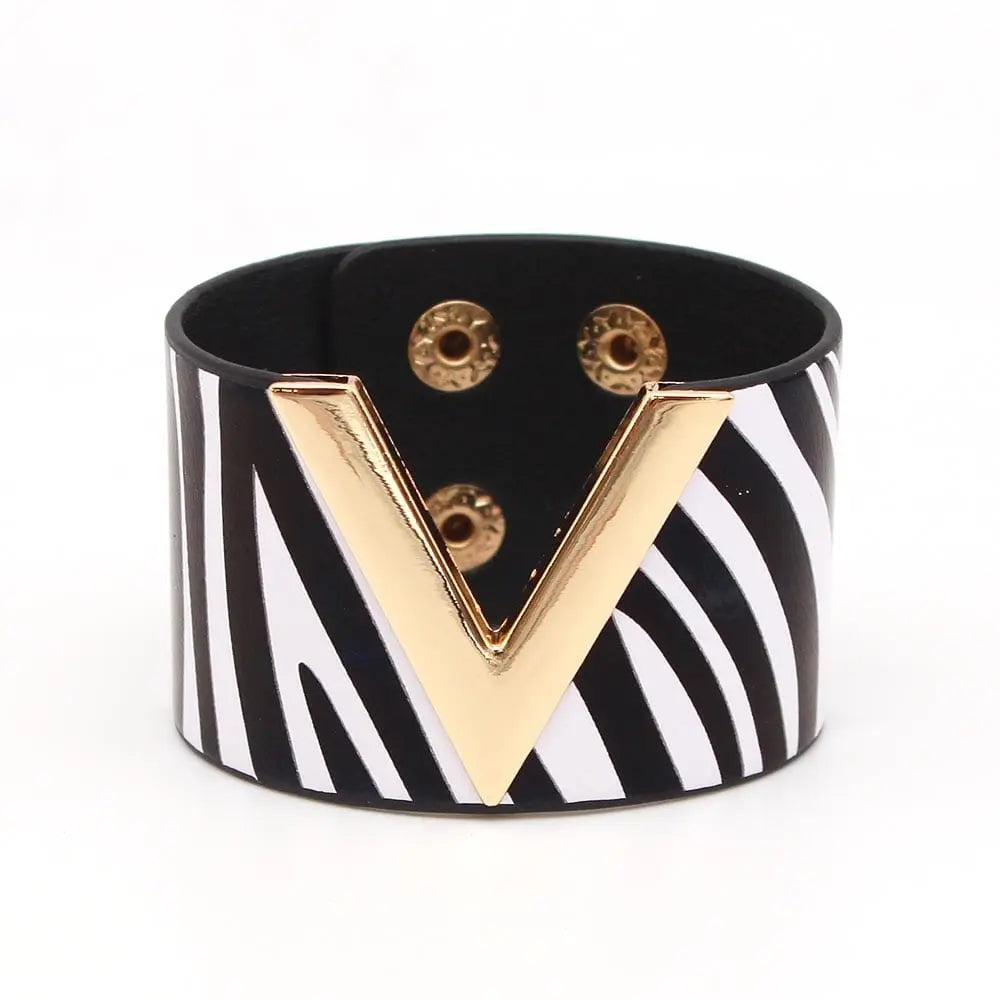 Leopard print leather wrap bracelet with geometric V charm, stylish cuff designed for women by Showlu Store Nation.