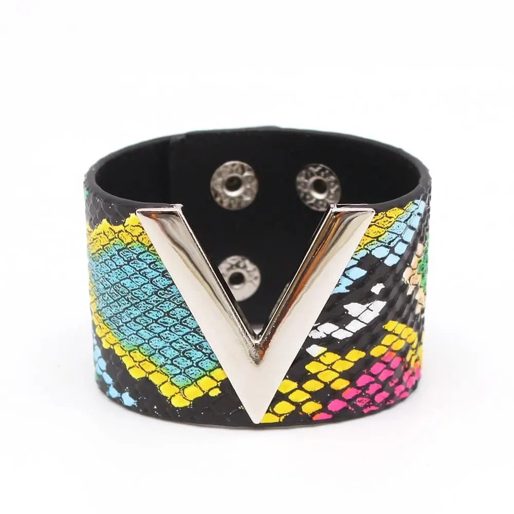Leopard print leather wrap bracelet with geometric V charm and cuff design, stylish jewelry for women.