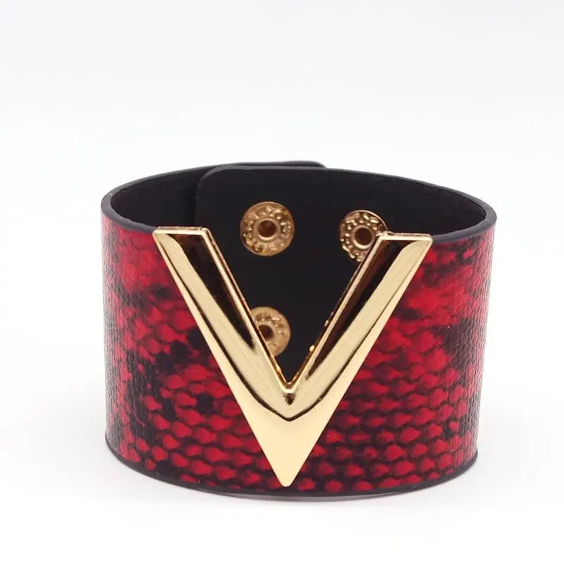 Leopard print leather wrap bracelet with V-shaped charm, geometric design, stylish cuff jewelry for women.