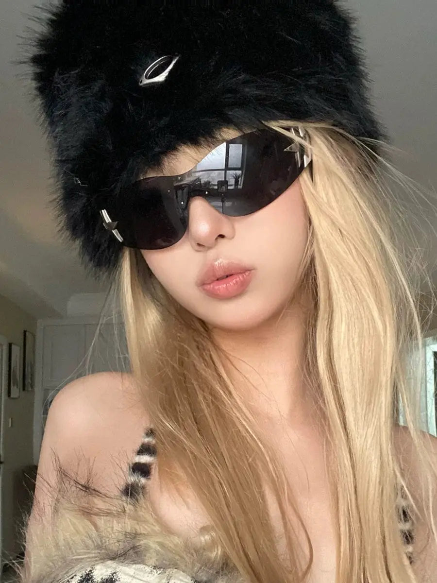 Orange frameless five-pointed star pilot sunglasses with trendy Y2K style for women, featuring a bold, modern sunshade design.